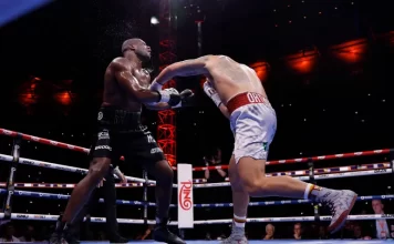 Anthony Joshua recovers from early knockdowns to knock out Kristian Prenga